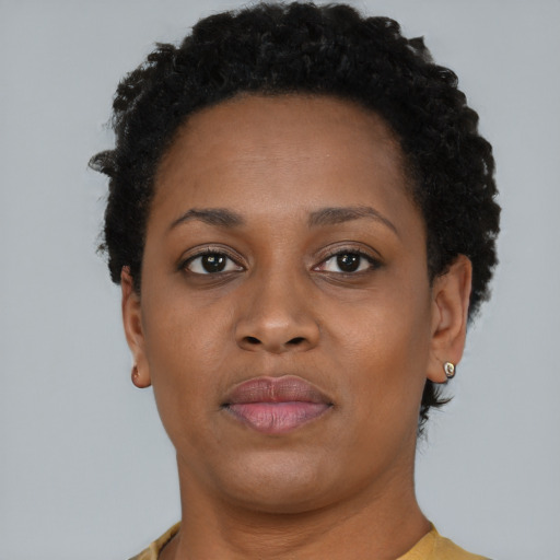 Neutral black young-adult female with short  brown hair and brown eyes