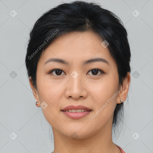 Joyful asian young-adult female with medium  brown hair and brown eyes