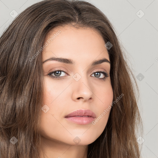 Neutral white young-adult female with long  brown hair and brown eyes