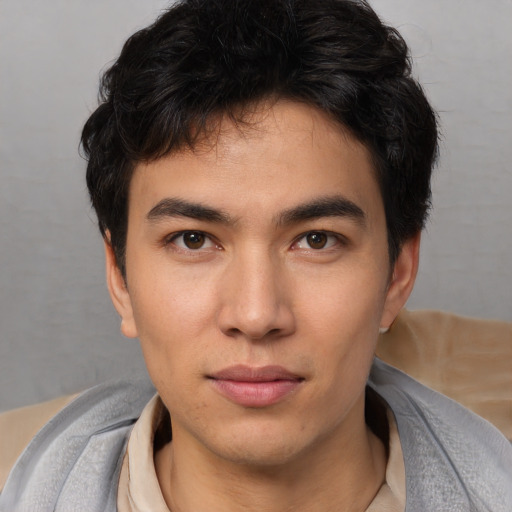 Neutral white young-adult male with short  black hair and brown eyes