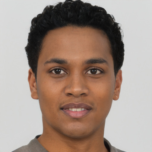 Neutral black young-adult male with short  black hair and brown eyes