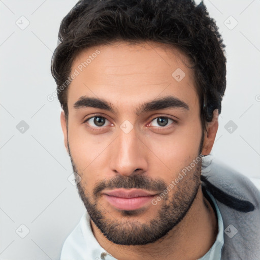 Neutral white young-adult male with short  brown hair and brown eyes