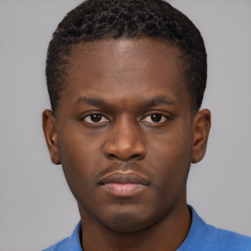 Neutral black young-adult male with short  brown hair and brown eyes