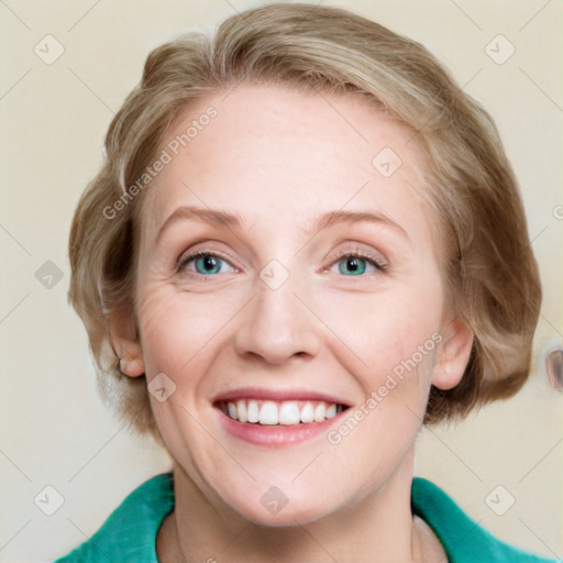 Joyful white adult female with medium  brown hair and green eyes