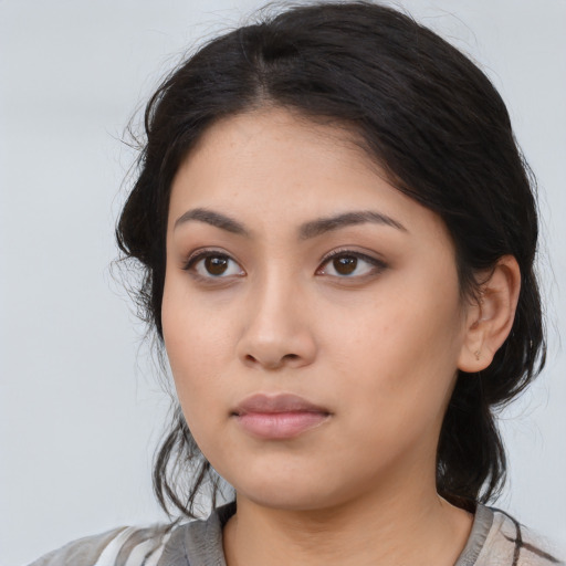 Neutral asian young-adult female with medium  black hair and brown eyes