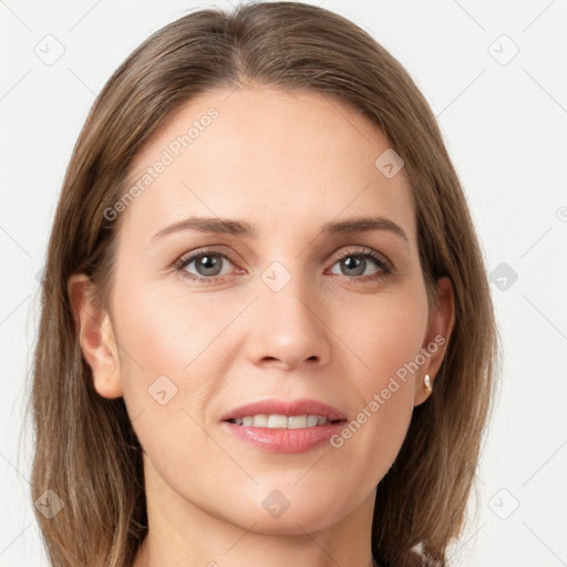 Joyful white young-adult female with long  brown hair and grey eyes