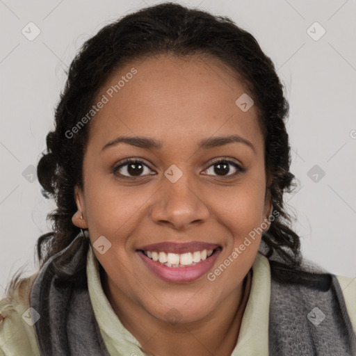 Joyful black young-adult female with long  brown hair and brown eyes