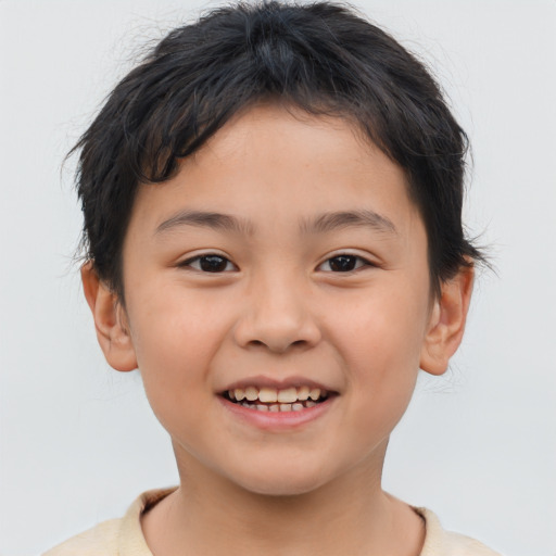 Joyful asian child female with short  brown hair and brown eyes