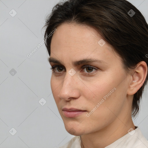 Neutral white young-adult female with medium  brown hair and brown eyes