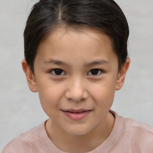Joyful white child female with short  brown hair and brown eyes