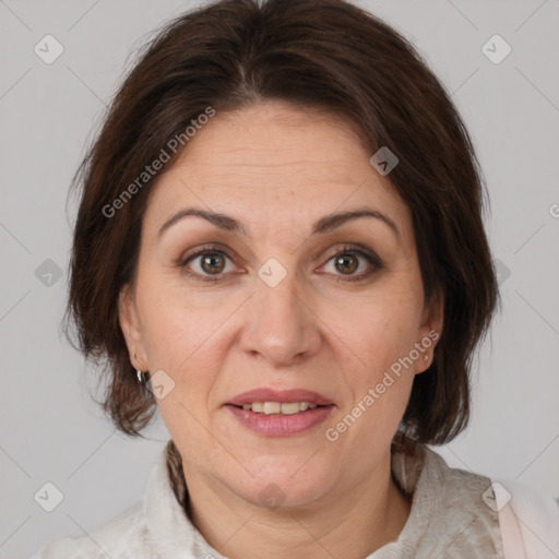 Joyful white adult female with medium  brown hair and grey eyes