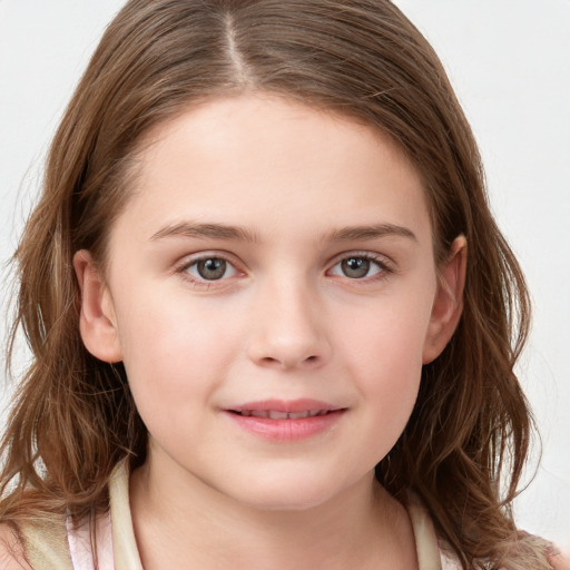 Joyful white child female with long  brown hair and grey eyes