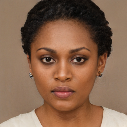 Neutral black young-adult female with short  black hair and brown eyes