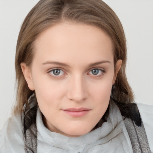 Neutral white young-adult female with medium  brown hair and grey eyes