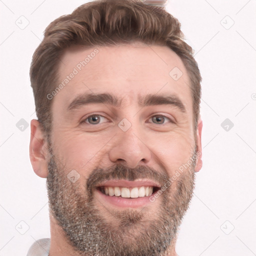 Joyful white adult male with short  brown hair and brown eyes