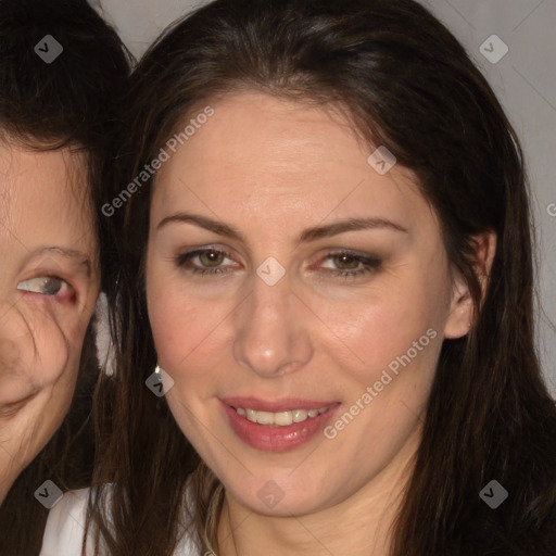 Joyful white adult female with long  brown hair and brown eyes