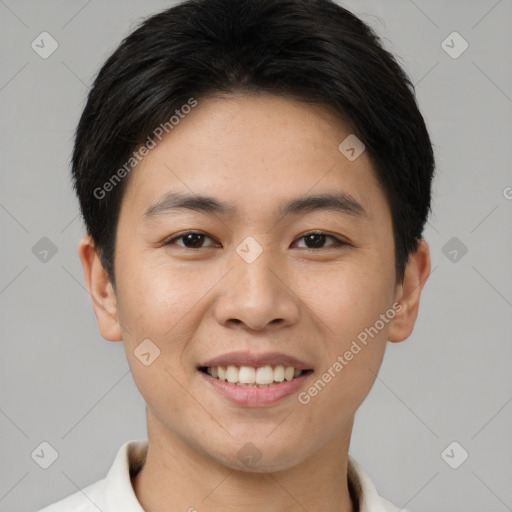 Joyful asian young-adult male with short  brown hair and brown eyes