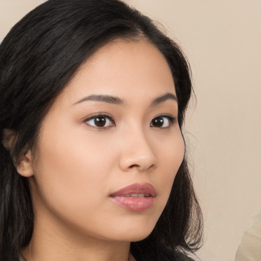 Neutral asian young-adult female with long  brown hair and brown eyes