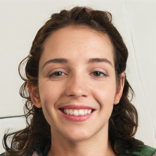 Joyful white young-adult female with medium  brown hair and green eyes