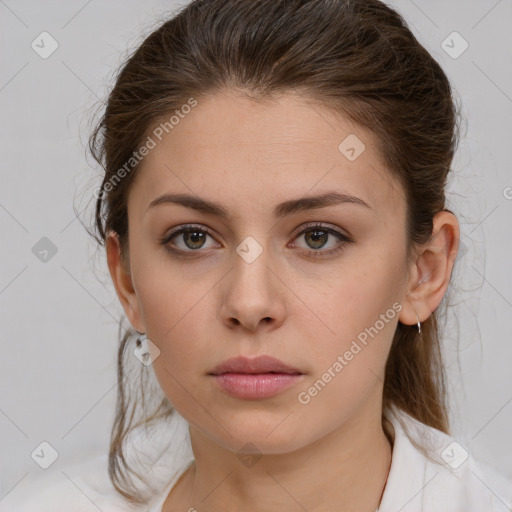 Neutral white young-adult female with medium  brown hair and brown eyes