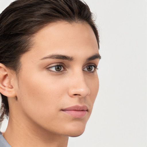 Neutral white young-adult female with medium  brown hair and brown eyes