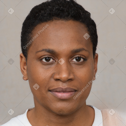 Joyful black young-adult female with short  black hair and brown eyes