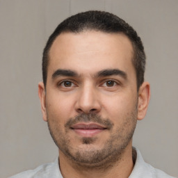 Neutral white young-adult male with short  black hair and brown eyes