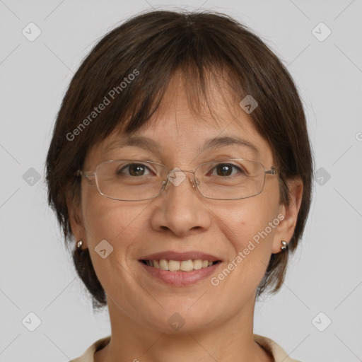 Joyful white adult female with medium  brown hair and brown eyes