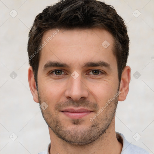 Joyful white young-adult male with short  brown hair and brown eyes