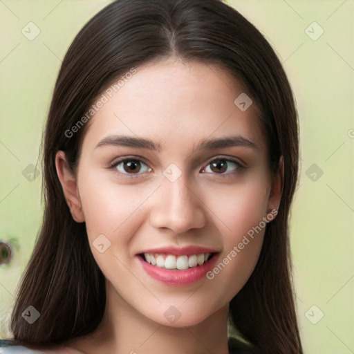 Joyful white young-adult female with long  brown hair and brown eyes