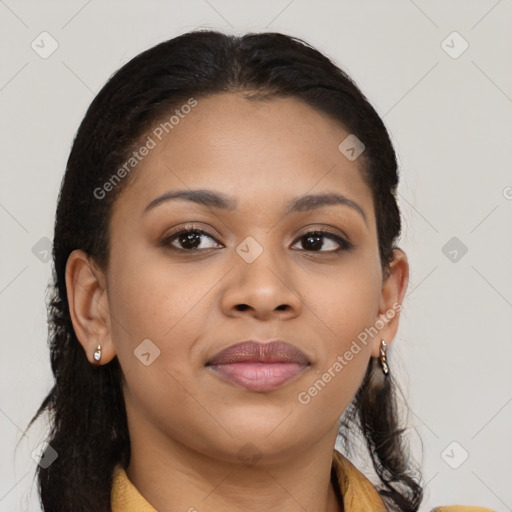 Joyful black young-adult female with long  brown hair and brown eyes