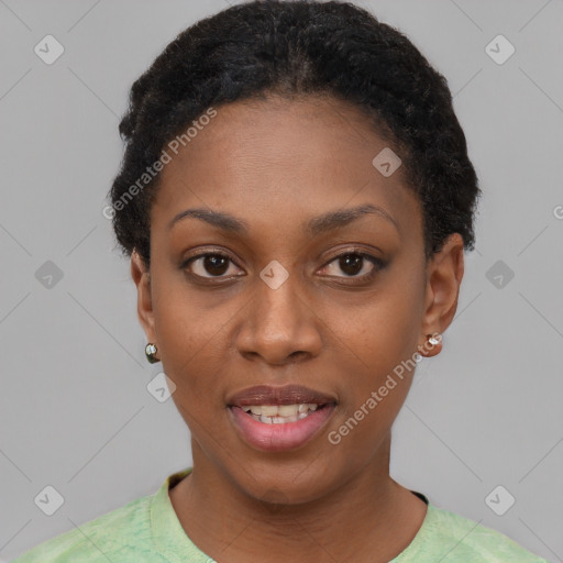 Joyful black young-adult female with short  black hair and brown eyes