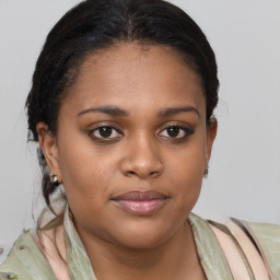 Joyful black young-adult female with medium  brown hair and brown eyes