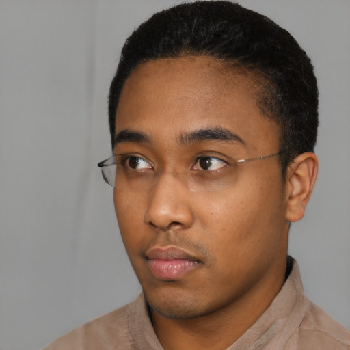 Neutral black young-adult male with short  black hair and brown eyes