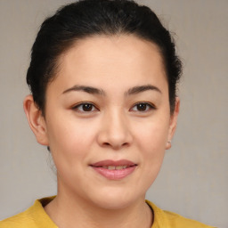 Joyful asian young-adult female with short  brown hair and brown eyes