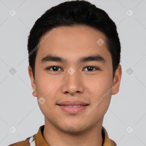 Joyful white young-adult male with short  black hair and brown eyes