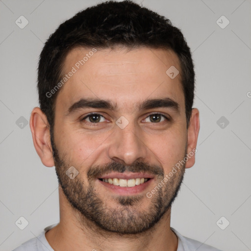 Joyful white young-adult male with short  brown hair and brown eyes