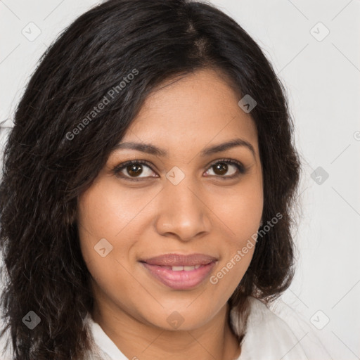 Joyful latino young-adult female with long  brown hair and brown eyes