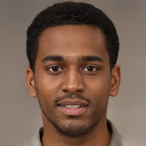 Neutral black young-adult male with short  brown hair and brown eyes