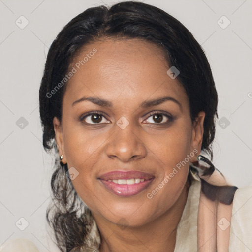 Joyful black adult female with medium  brown hair and brown eyes