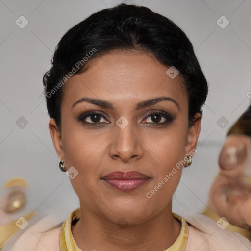 Joyful latino young-adult female with short  brown hair and brown eyes