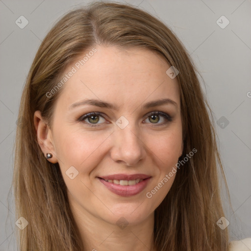 Joyful white young-adult female with long  brown hair and green eyes