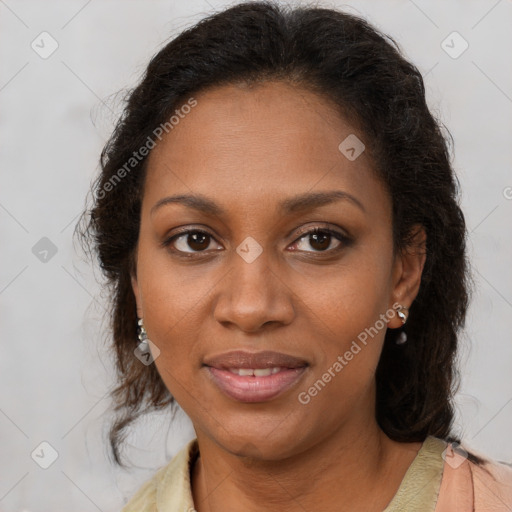 Joyful black young-adult female with medium  brown hair and brown eyes