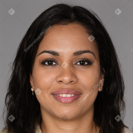 Joyful black young-adult female with long  brown hair and brown eyes