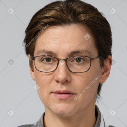 Joyful white adult female with short  brown hair and brown eyes