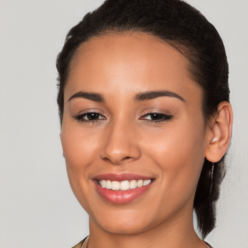 Joyful white young-adult female with medium  brown hair and brown eyes