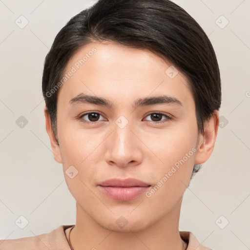 Joyful white young-adult female with short  brown hair and brown eyes