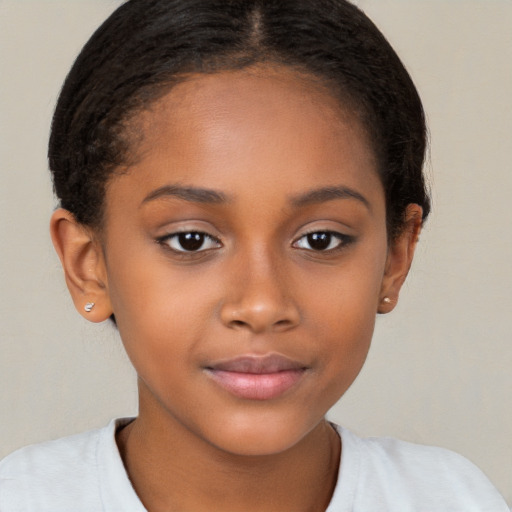 Joyful black child female with short  brown hair and brown eyes