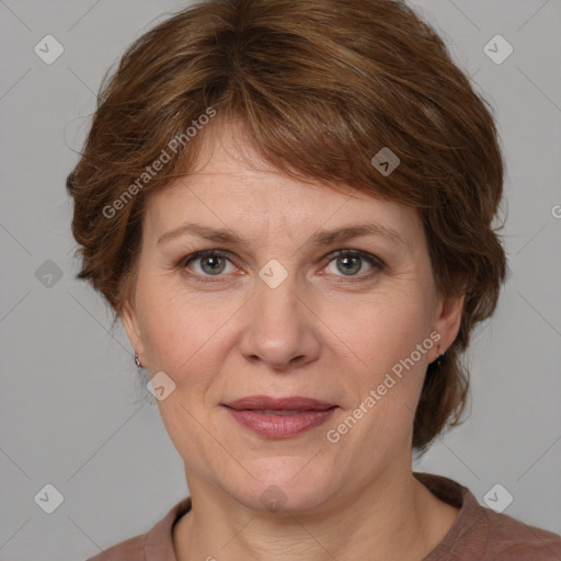 Joyful white adult female with medium  brown hair and grey eyes