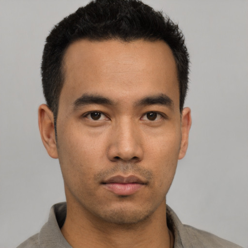 Neutral asian young-adult male with short  black hair and brown eyes